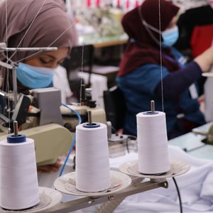 Syrian refugee garment worker in Jordan factory