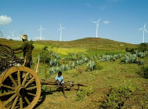 India fields and wind turbines