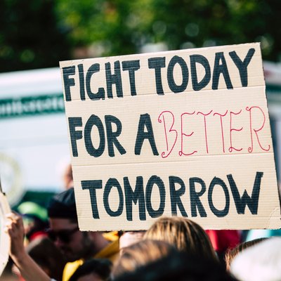 Sign saying "fight today for a better tomorrow"